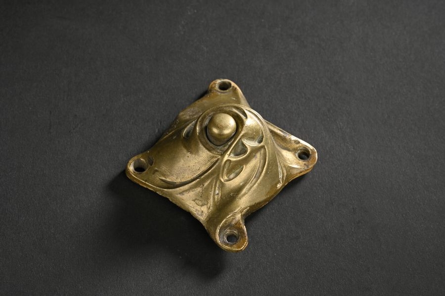 Hector Guimard | Patinated brass landing doorbell with turning and Hector Guimard Door Bell Pull