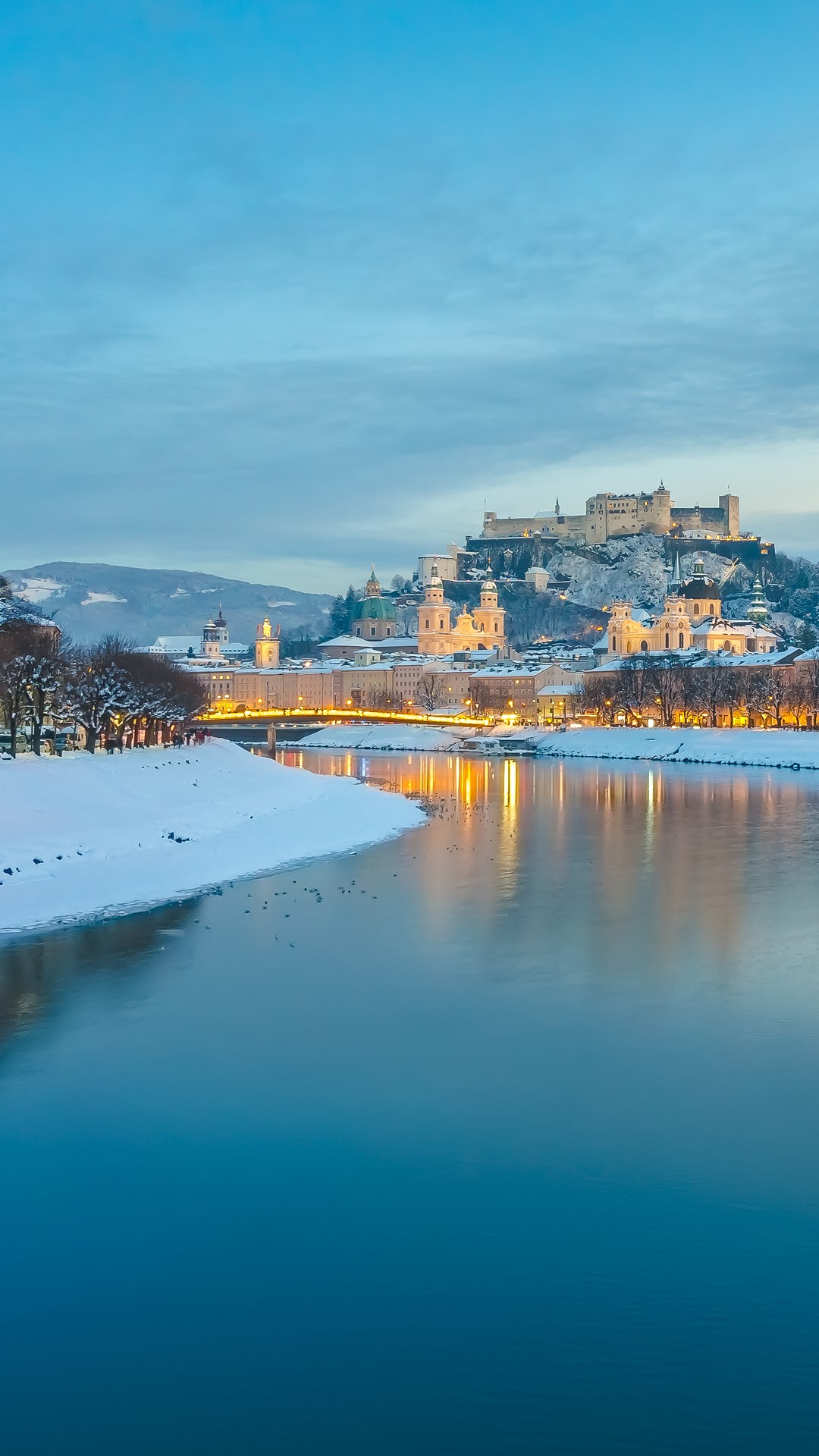 Historic city of Salzburg with Salzach river in winter blue hour Austria Podział Na Regiony Turystyczne