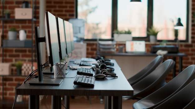 Premium Photo | Empty call center workstation with headsets and Mary And Pablo Share A Customer Support Workstation