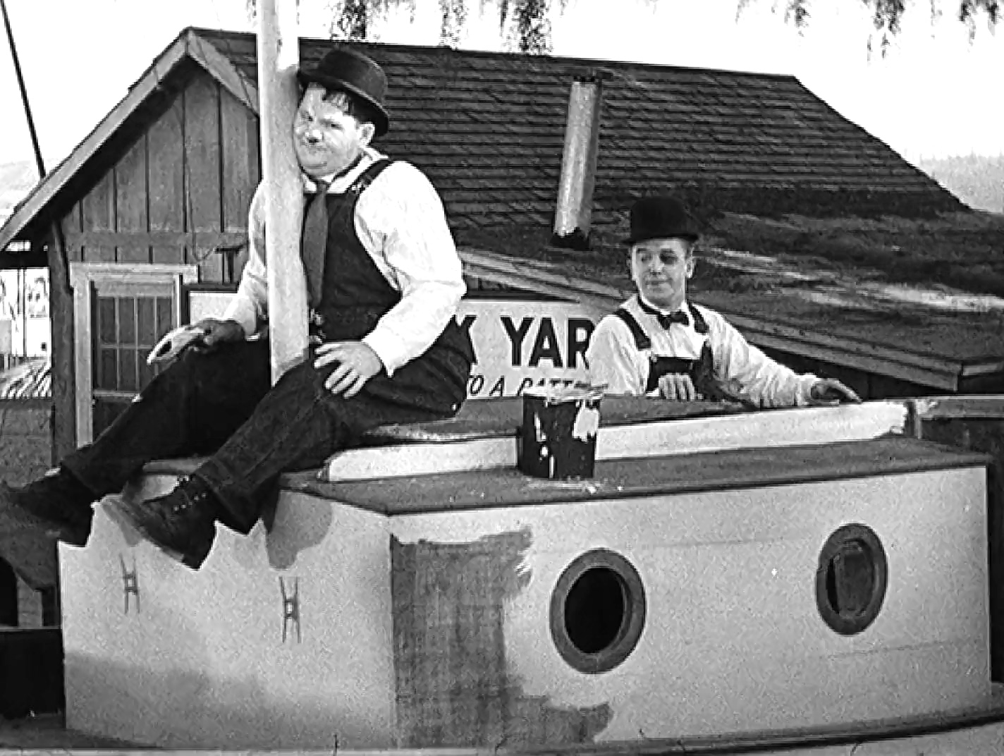 Stan Laurel Laurel And Hardy Towed In A Hole