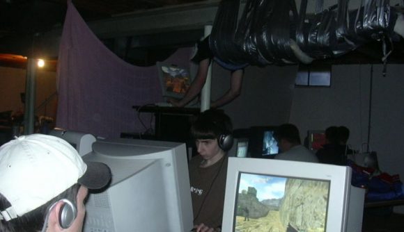 That picture of a gamer duct-taped to the ceiling is getting a Guy Taped To Ceiling Lan Party